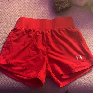 Under Armour shorts, size small, Red in color.